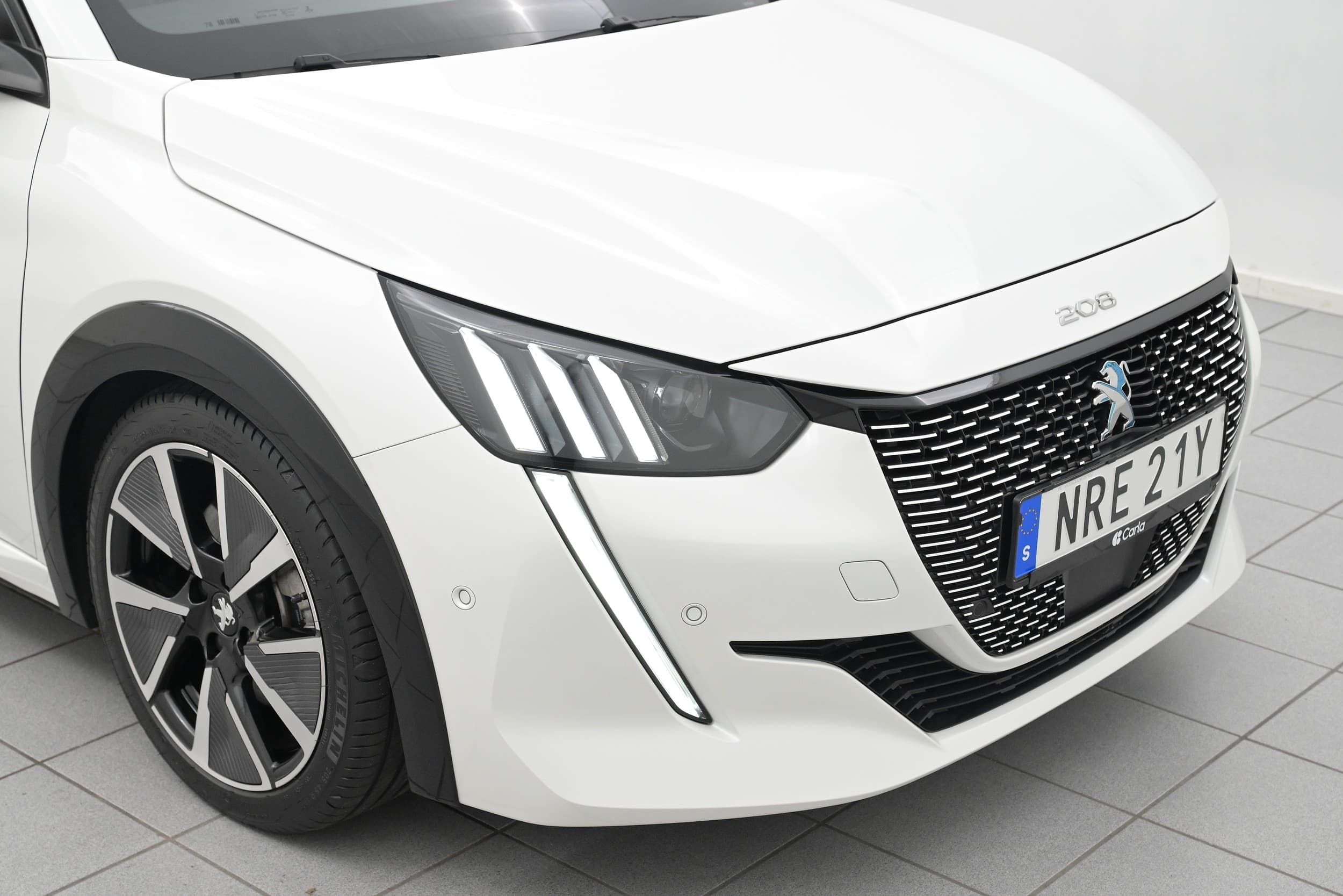 Peugeot e-208